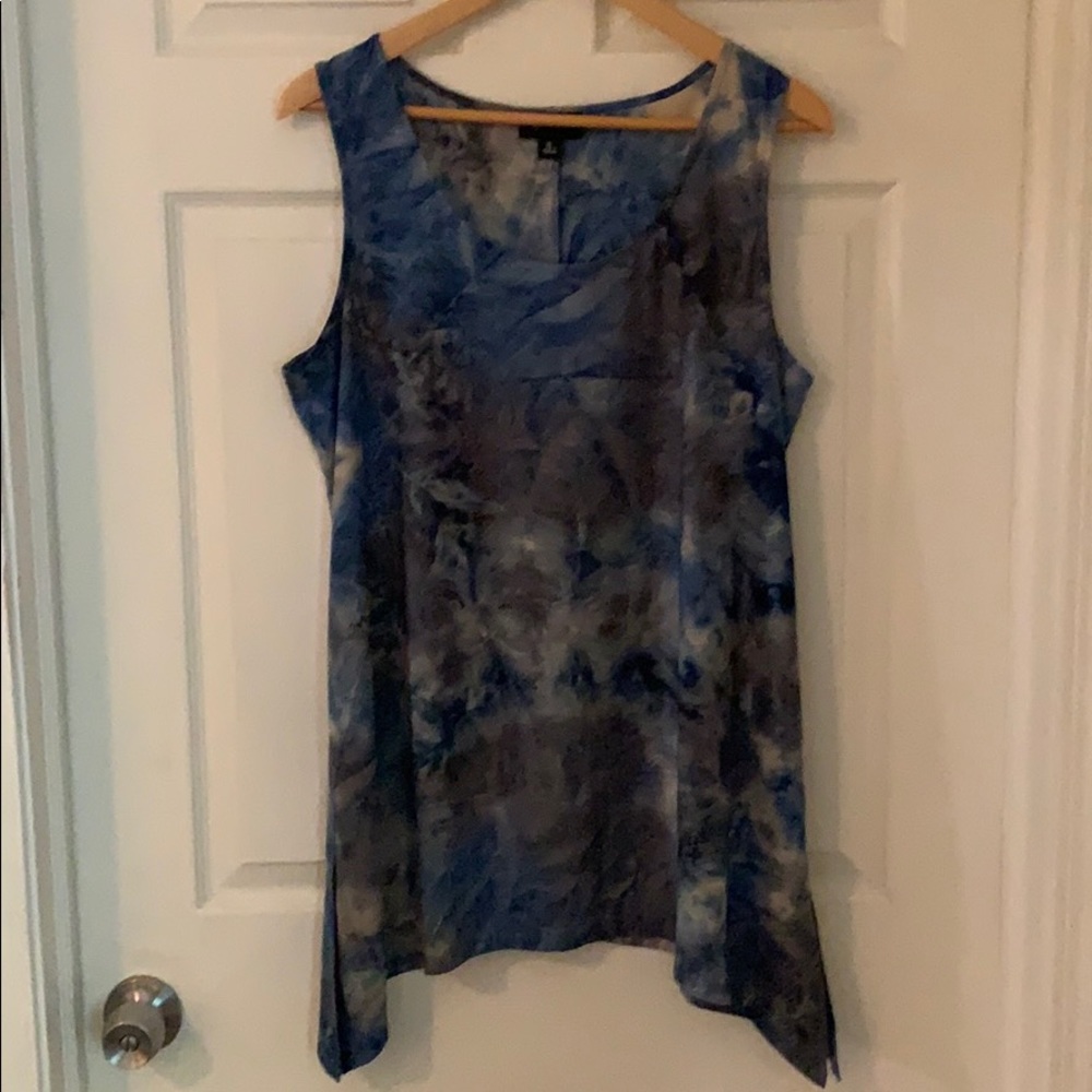 Multi colored sleeveless shirt. Size XL.